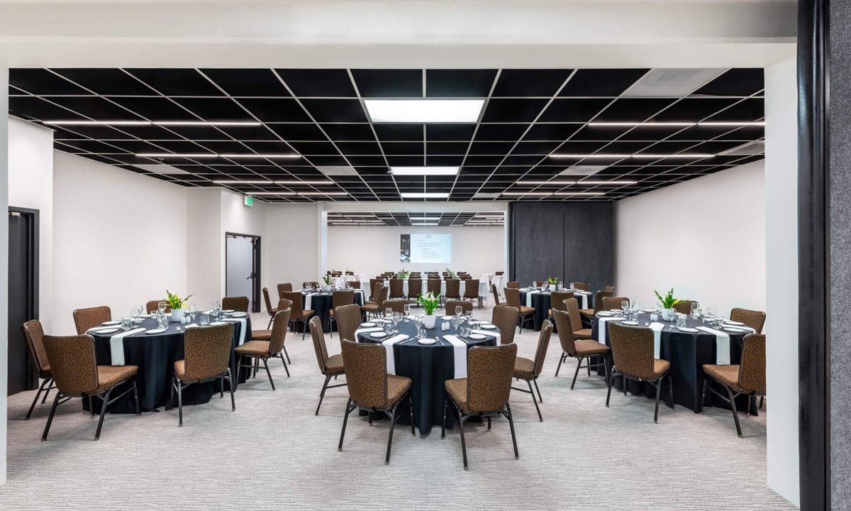 round tables setup for dining in meeting space at bei san francisco