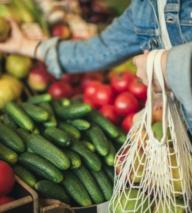 Close-up of ecologically friendly reusable bag with fruit and vegetables