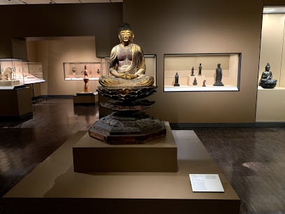 Asian Art Museum interior with buddha statues