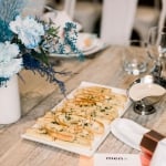 top down shot of flatbread and stylish table setting