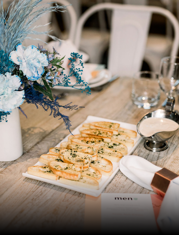 Toasted baguette served on table with flowers