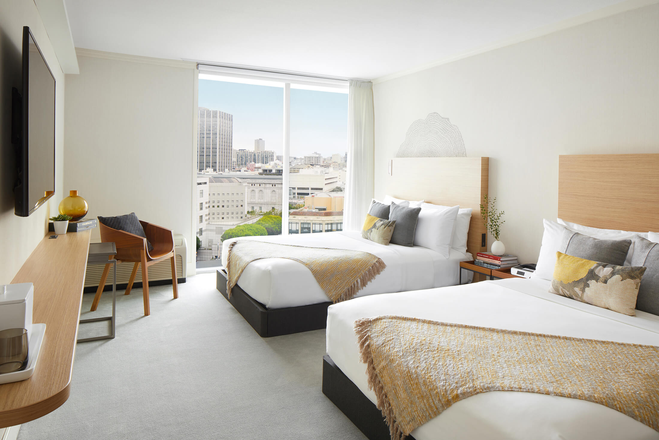 bei superior room featuring two beds and a city view