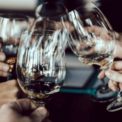 Clinking wine glasses