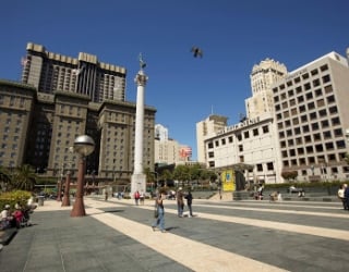 Union Square with people walking in the sun