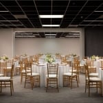 Banquet space setup with tables and chairs