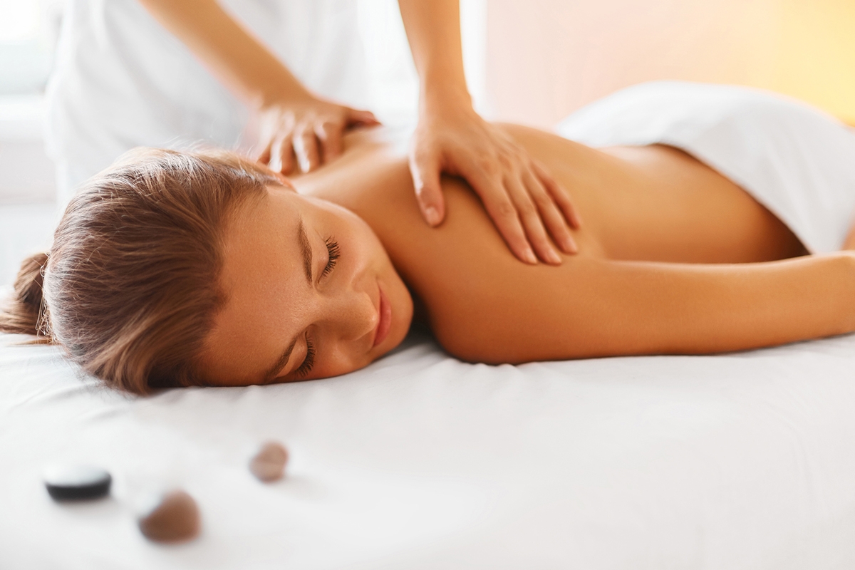 Woman getting back massage