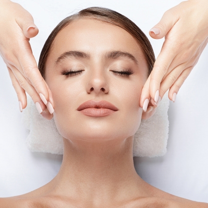 Woman getting facial massage
